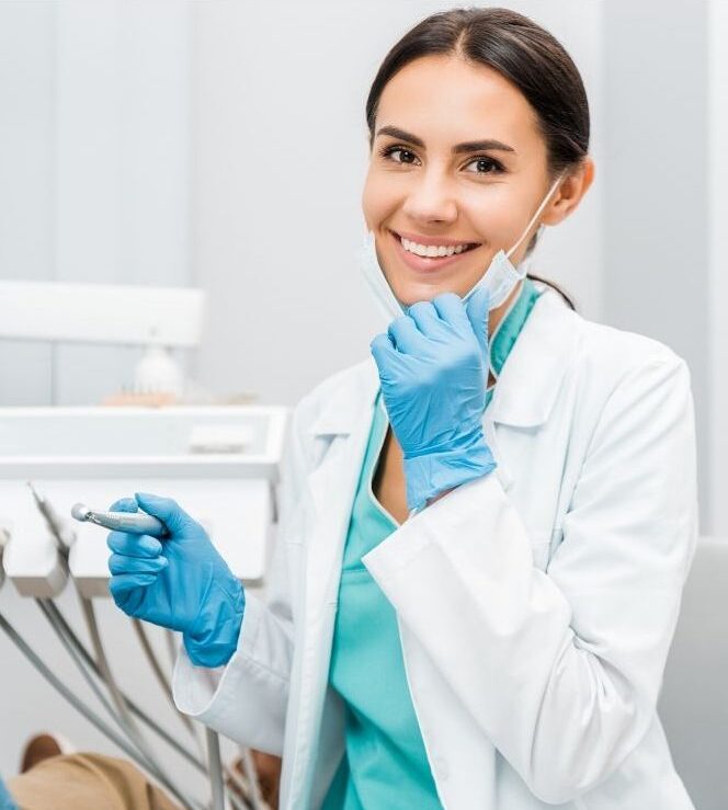 Dental-Followup dentist in clinic doing teeth cleaning